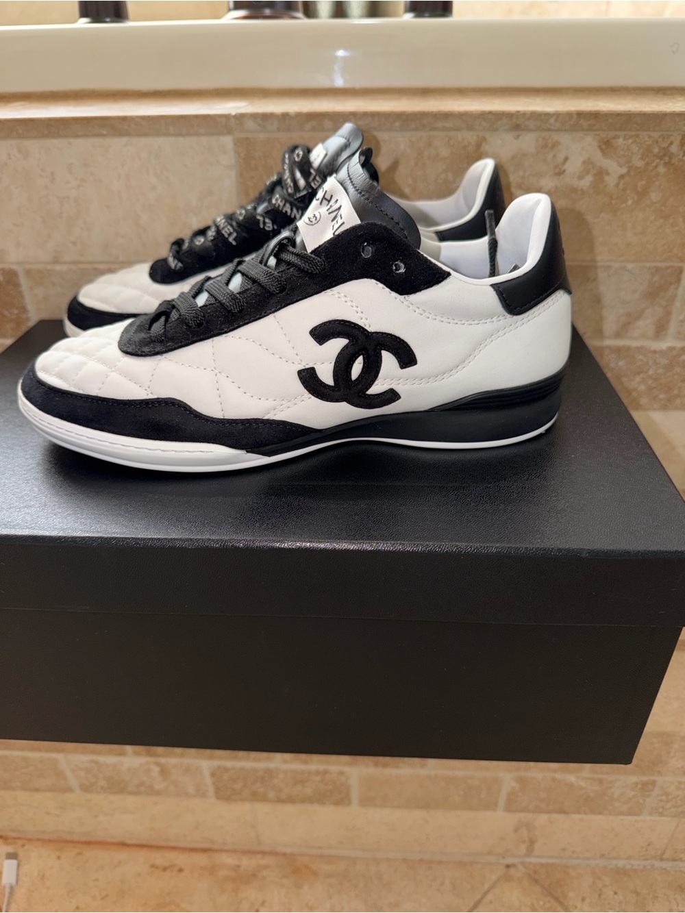 CHANEL Black and White Quilted Low-Top Sneakers Unisex 36